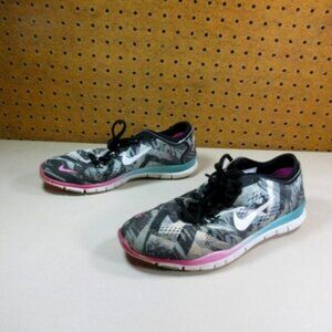 Nike womens gray an black 5.0 TR fit 4 PRT running shoes 7 M 629832